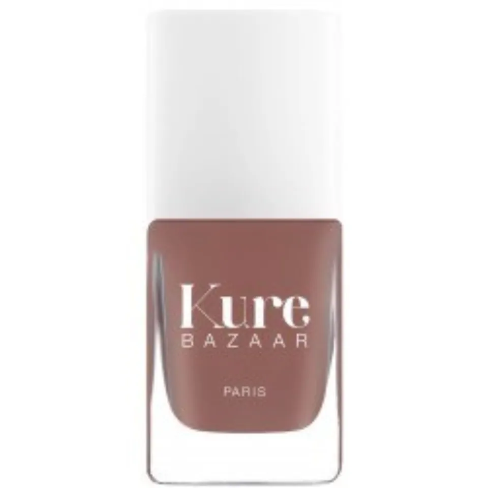 Brown nail polish bottle with white cap, labelled "Kure Bazaar Paris".