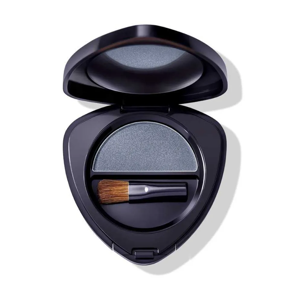 Open black eyeshadow compact with brush and grey-blue shade.