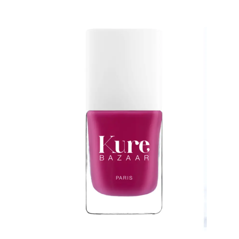 Kure Bazaar Paris nail polish in a vibrant pink shade.