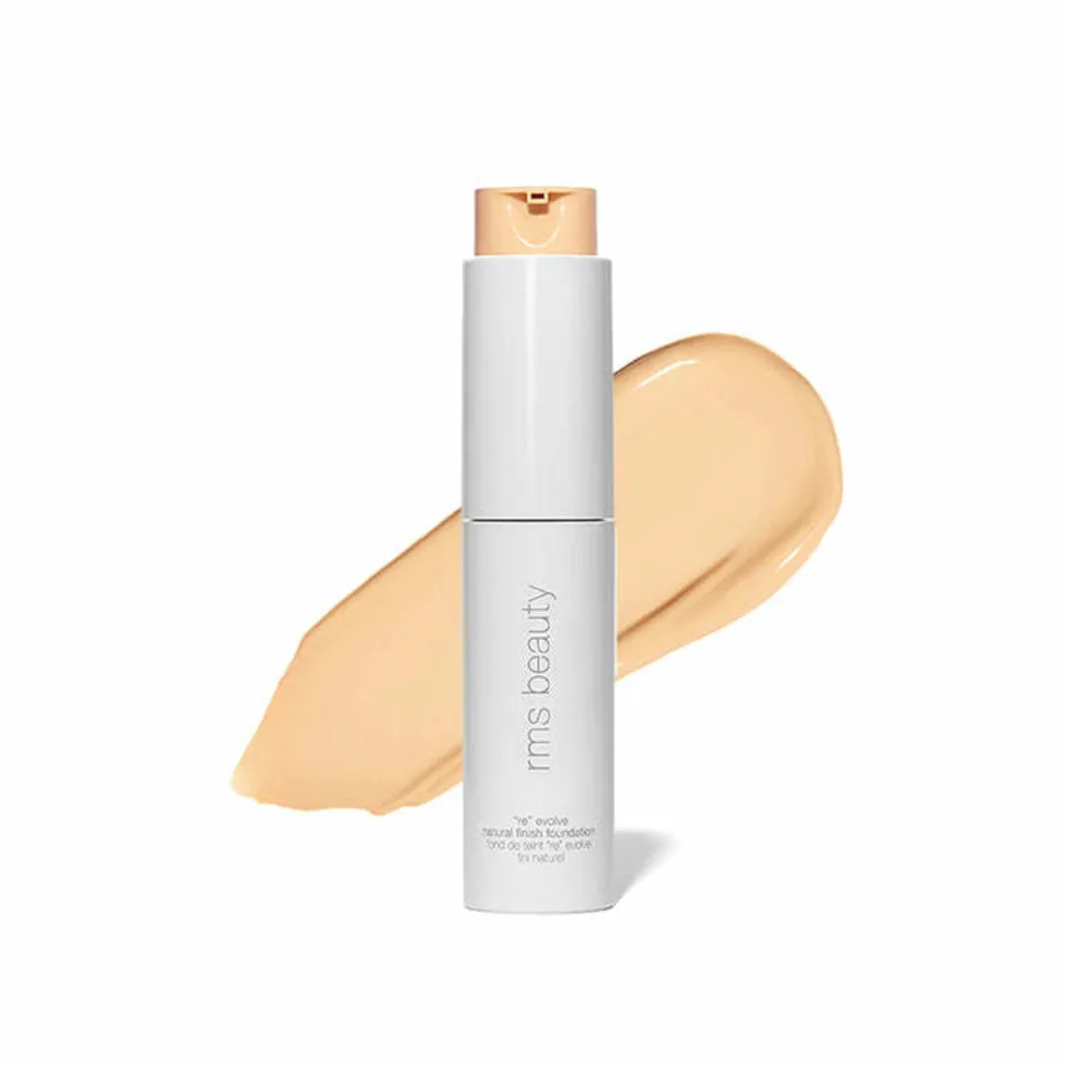 RMS Beauty foundation bottle with beige liquid swatch behind.