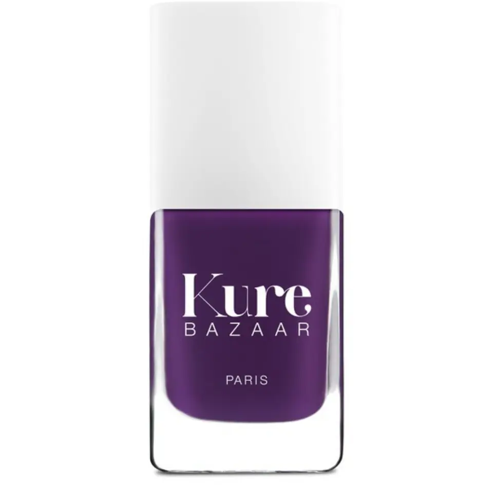 Kure Bazaar purple nail polish bottle with white cap.