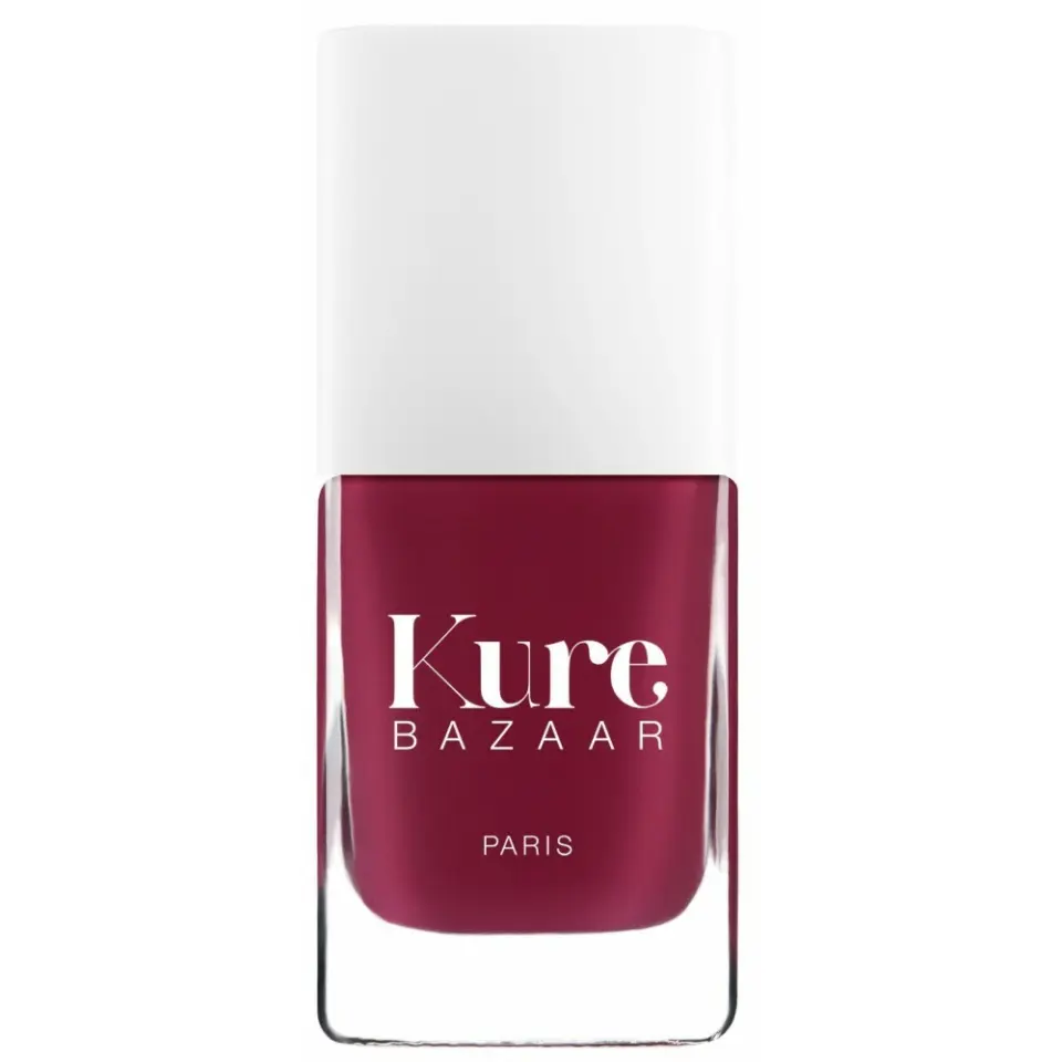 Kure Bazaar nail polish bottle with white cap and red colour.