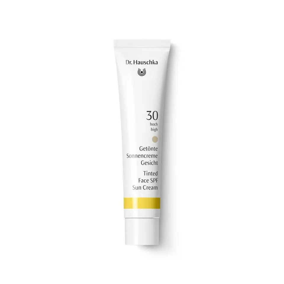 Dr. Hauschka Tinted Face SPF 30 Sun Cream tube on white background.