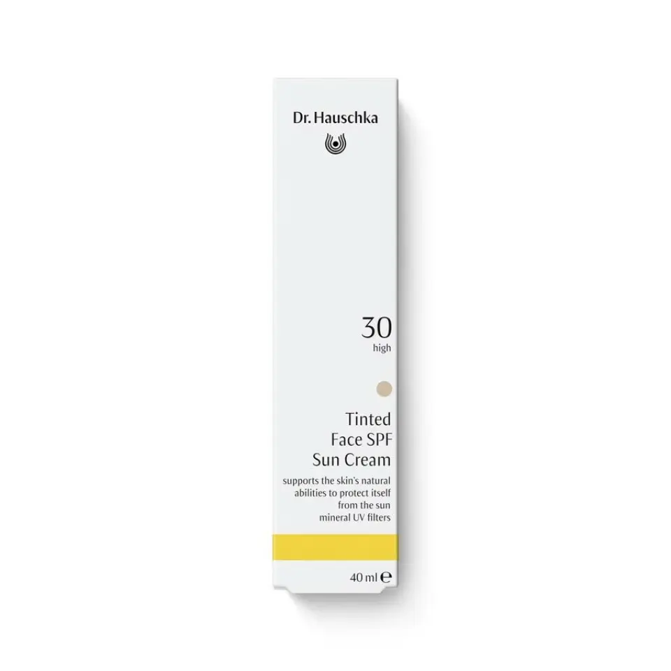 Dr. Hauschka Tinted Face SPF 30 Sun Cream, 40 ml, white box with yellow stripe.
