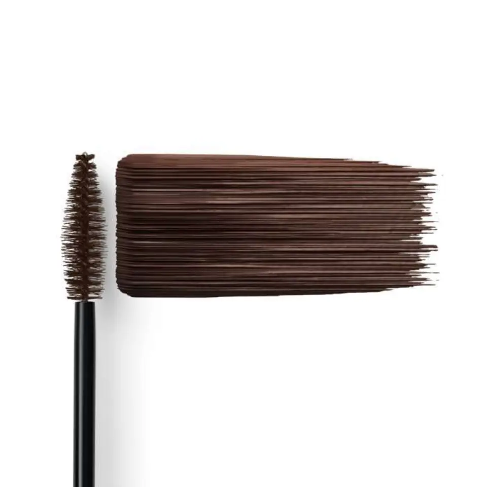 Mascara wand with brown mascara swatch on white background.