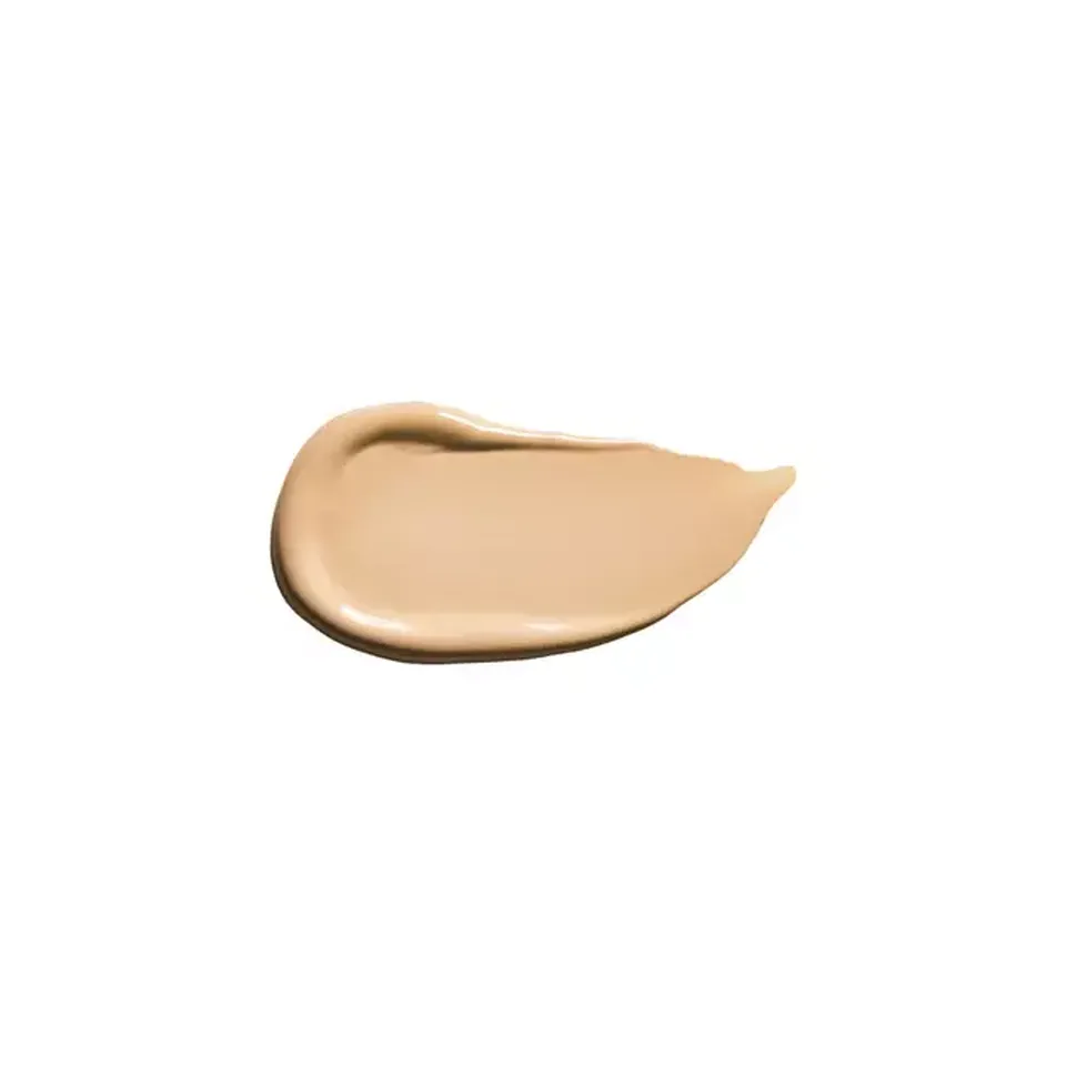 Beige cream foundation smear on white background.