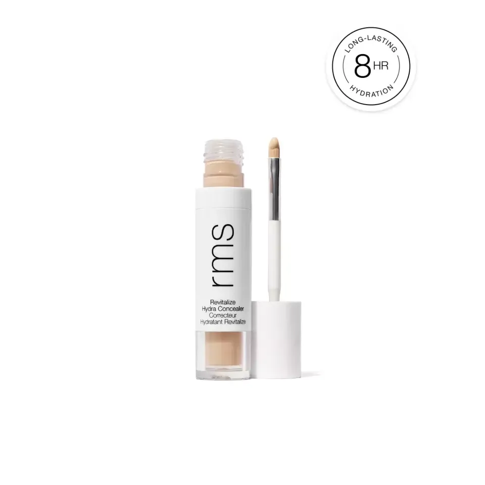 Rms Revitalize Hydra Concealer with applicator. Text: Long-lasting hydration 8 HR.