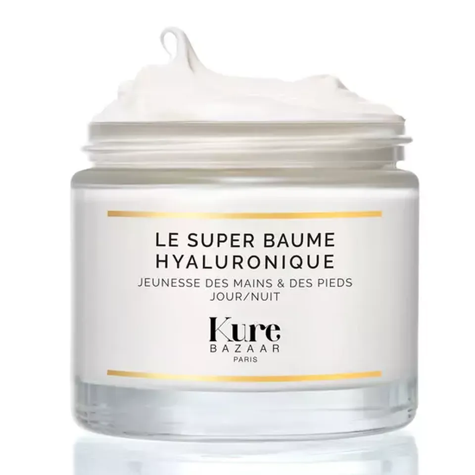 Kure Bazaar Le Super Baume Hyaluronique jar with cream on top.