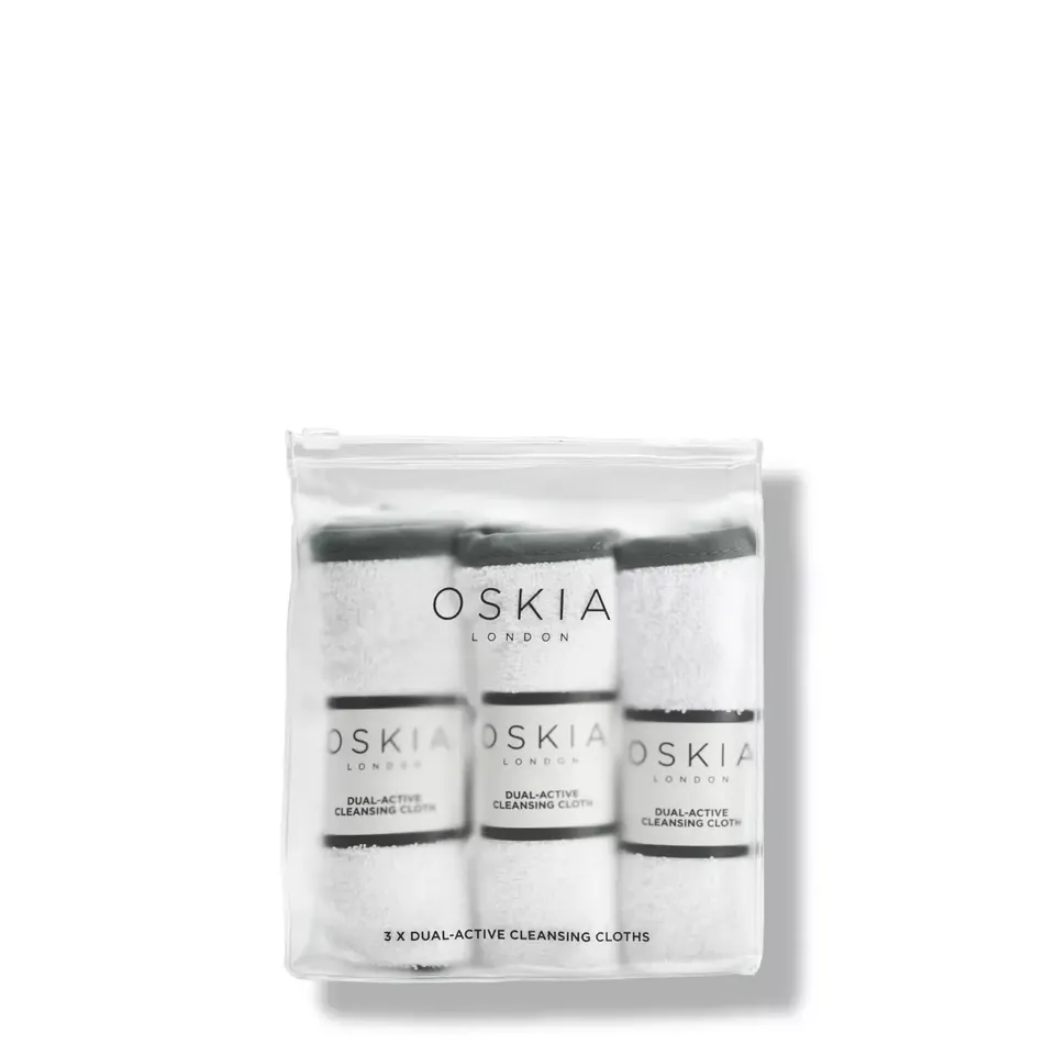 Oskia London dual-active cleansing cloths in a clear pouch.