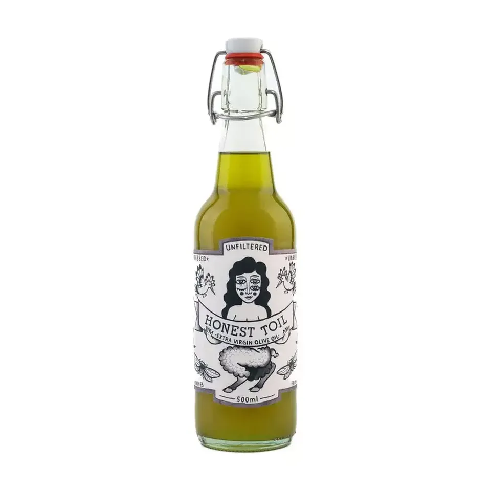 500ml bottle of Honest Toil unfiltered extra virgin olive oil with illustrated label.