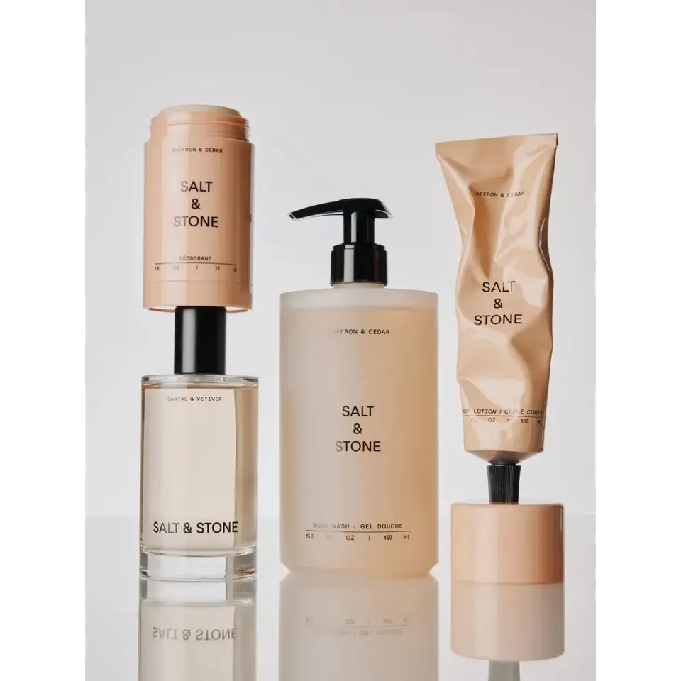 Salt & Stone skincare products: deodorant, body wash, lotion, and fragrance.